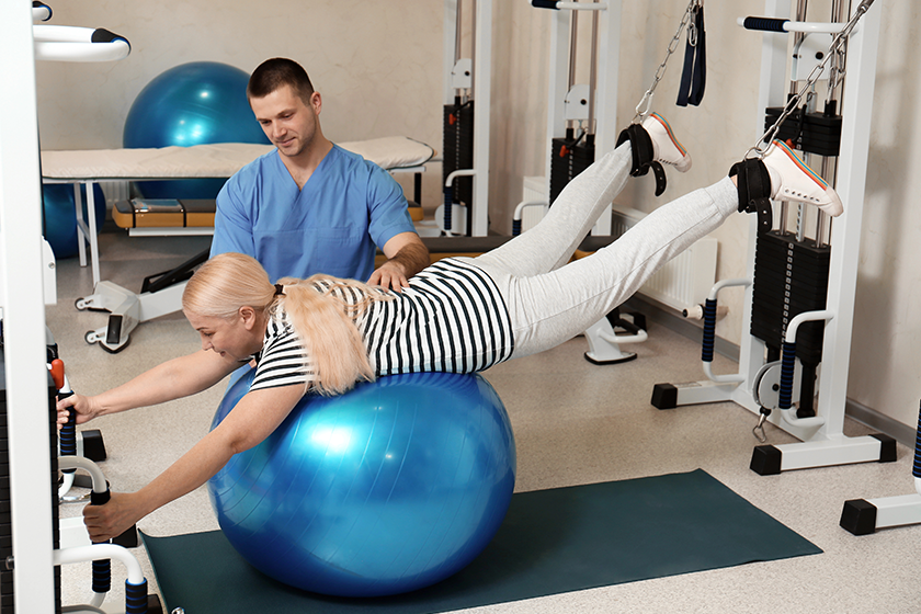 Patient exercising under physiotherapist supervision